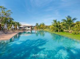 Apto em Cond. c/piscina em Praia do Forte CVAF0220, hotel in Praia do Forte