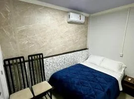 Loft Lux SM Chapecó | Compacto e Aconchegante com Ar, Cozinha e Smart TV