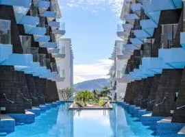 C198 Oceanview Stay Gym, Pool & Walk to Beach