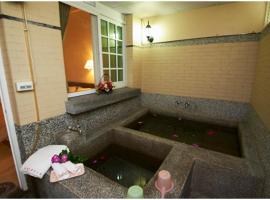 Songboling Hot Spring Inn, hotel v destinaci Liugui