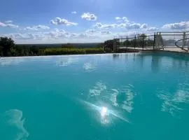 Vue exceptionnel-Piscine chauffée-salle de sport