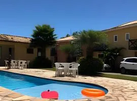 Casa super Charmosa em condomínio na praia