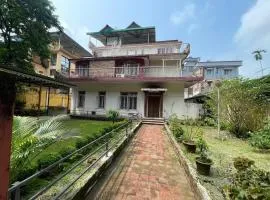 Nandy Bhavan - A premium 2 bhk bunglaow with lawn in the heart of Siliguri