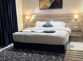 شقق تولين الذهبية المخدومة, alojamiento con cocina en Al Bahah