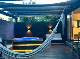 Uma Casa na Praia do Rosa com Jacuzzi