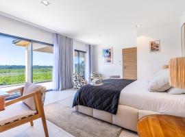 Royal Tiki Lodges - Maison d'hôtes avec Piscine chauffée & SPA, hôtel à Plaissan