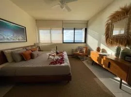 Sunset 2BR Apartment Steps from the Beach with Ocean View