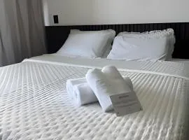 Flat a 50 metros da praia + piscina e área gourmet