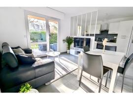 Apt with garden in Ferney Ideal UN or CERN, ξενοδοχείο σε Ornex