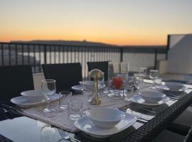 Seafront Penthouse with Large Terrace and Panoramic Views-Mellieha Bay Ghadira, hotel in Mellieħa