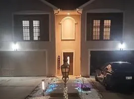 Bring the Crew! 4BR Luxe Pad, Backyard Magic & City at Your Door