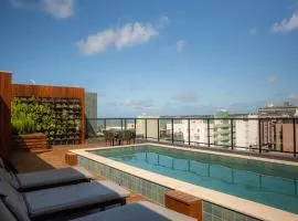Flat com dois quartos na praia do Cabo Branco - climatizado e completo