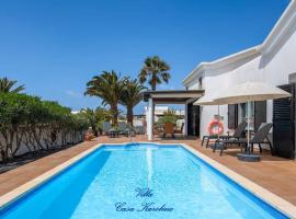 Villa Casa Karoline with a sunny terrace, heated pool, comfort and privacy in a quiet neighborhood