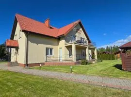 ProstyWynajem - Słoneczny Domek ROWY