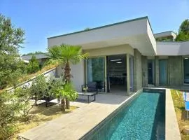 Holiday Home near Rodonit Beach with Garden