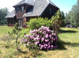 Brīvdienu māja Zemeņlauki, отель в городе Saunags