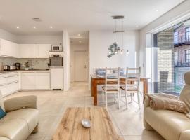 Pusteblume - Barrierefreie 5-Sterne-Ferienwohnung mit Seeblick und Sauna, hotel in Malchow