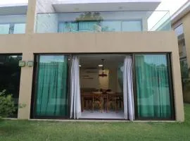 Casa em condomínio até 06 pessoas a 5min da Praia