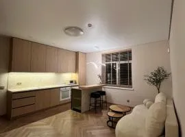 Apartamentai pirmame aukšte, miesto centre