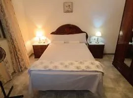 01 Habitación en hogar tranquilo, casa conpartilhada