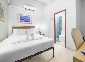 Room 9 Sleek & Serene Stay in San Juan, hotel cerca de Aeropuerto de Isla Grande - SIG, San Juan