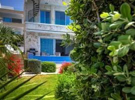 Olymp Luxury Villa D - Luxury Escape with Direct Beach Access and Unique Sunsets