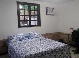 Quarto em casa na Mata Atlântica