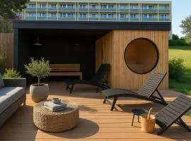Lille villa med havudsigt og privat sauna