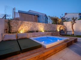 Sunset apartments Njivice, hotel com banheiras de hidromassagem em Njivice