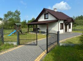 Domek nad jeziorem w Świekatowie โรงแรมในŚwiekatowo