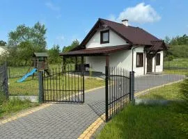 Domek nad jeziorem w Świekatowie