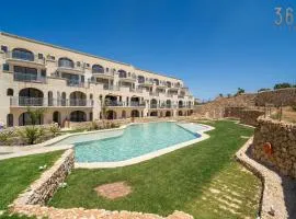 Serene Apt with Terrace & Pool & BBQ Access,Qala by 360 Estates