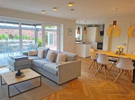 Wilde Brise 3 – Luxusbungalow in bester Lage in Norddeich, hotel v destinaci Norddeich