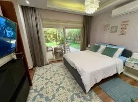 Top rated 1 BR with private garden in Karma Sheikh Zayed - only families & single travelers