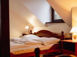 Pod Kogutem – hotel w mieście Cierzpięty