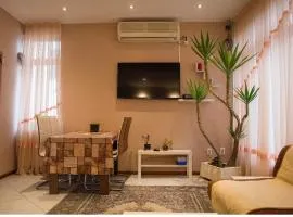 Charming 2BR Apartment near Center with Yard