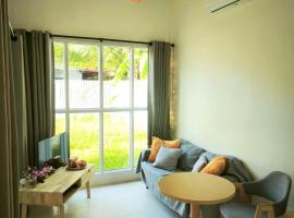 Cozy house by the sea，位于帕干岛的酒店