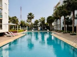 Bright Apt with Balcony, WiFi, Parking and Pool Resort