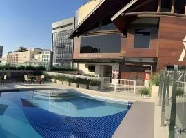 Queridinho Studio centro+Piscina+Netflix+WiFi