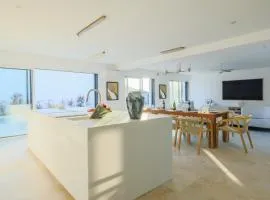 Villa magnifique climatisée 4 chambres, 4 salles de bain avec piscine chauffée, salle de sport proche mer