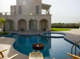 Stunning Mediterranean Style 3 BHK Villa With Outdoor Bar, Pool and Garden