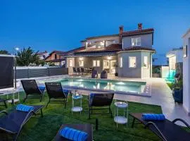 Villa Spa Otium for 8 people with 32 m2 heated pool, outdoor cinema, kids playground & spa area