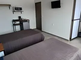 SUITE Clavel, AA, cocineta, baño privado, ubicació