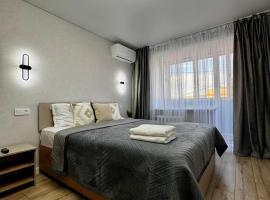 Квартира с видом на город, accommodation in Ustʼ-Kamenogorsk