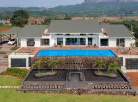 StayVista's Villa 107 at Canary Farms - Pure Veg with Huge Lawn, Pool and Home Theatre