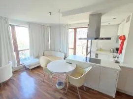 Charming Apartment with a Tranquil Balcony Garden View
