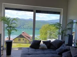 Modern house in the woods with a view of Millstättersee