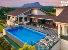 StayVista's The Tavern At Canary Farms - Mountain-View Luxury Mansion with Infinity Pool, Jacuzzi & Games Zone