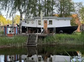 Cozy little house with sauna on a fishing boat