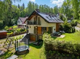 Mazursko - komfortowe apartamenty nad jeziorem, sauna, kominki na parterze